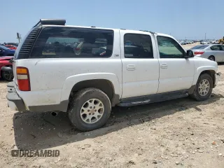 2003 Chevrolet Suburban LT with VIN 3GNFK16T83G297134, listed as a Copart auction lot 56761734 with 303,349 mi miles and Salvage Title. Bid and sale history available at carsss.com. Image 3.