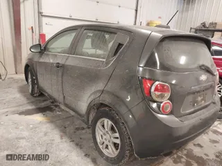 2015 Chevrolet Sonic LT with VIN 1G1JC6SGXF4205148, listed as a IAAI auction lot 41591559 with 144,048 mi miles. Bid and sale history available at carsss.com. Image 3.