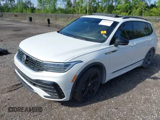 2023 Volkswagen Tiguan SE R-Line Black with VIN 3VVCB7AX9PM042025, listed as a IAAI auction lot 41913943 with 114,097 mi miles and . Bid and sale history available at DreamBid. Image 2.
