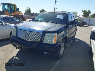 2004 Cadillac Escalade z VIN 1GYEC63T94R235191, wystawiony jako IAAI lot #42314704 z przebiegiem 164 935 mil mil oraz . Historia ofert i sprzedaży dostępna na DreamBid. Obrazek 2.