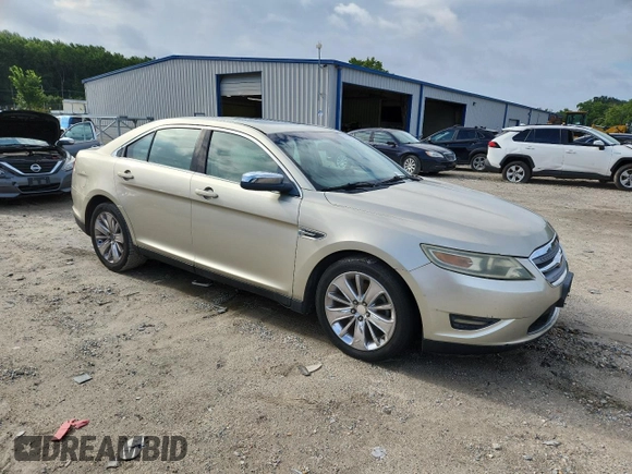 2010 Ford Taurus Limited with VIN 1FAHP2FW7AG138753, listed as a Copart auction lot 64880025 with 242,728 mi miles and Clean title. Bid and sale history available at DreamBid. Image 4.