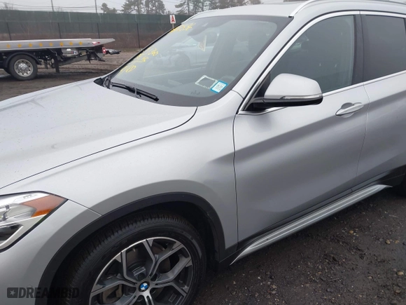 2021 BMW X1 xDrive28i with VIN WBXJG9C04M5T79810, listed as a IAAI auction lot 41471536 with 75,345 mi miles. Bid and sale history available at carsss.com. Image 6.