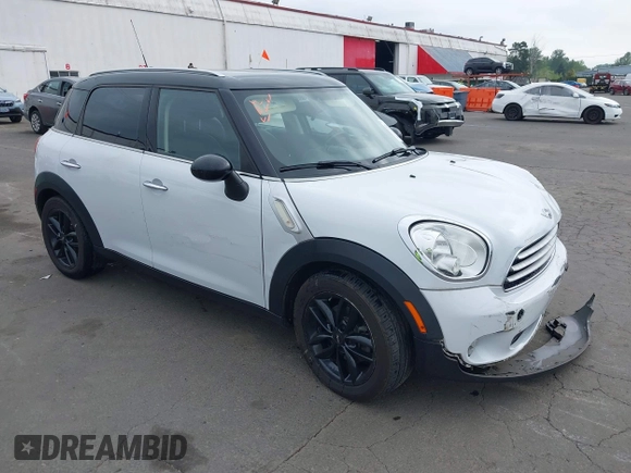 2012 MINI Countryman with VIN WMWZB3C57CWM04258, listed as a IAAI auction lot 42116867 with 168,550 mi miles and . Bid and sale history available at DreamBid. Image 1.