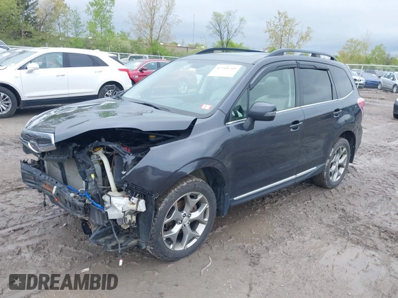 2016 Subaru Forester Touring z VIN JF2SJAXC4GH536118, wystawiony jako IAAI lot #42208701 z przebiegiem 117 227 mil mil oraz . Historia ofert i sprzedaży dostępna na DreamBid. Obrazek 17.