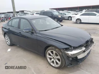 2015 BMW 3 Series 328i xDrive with VIN WBA3B3C54FJ984107, listed as a IAAI auction lot 41565829 with 98,557 mi miles. Bid and sale history available at carsss.com. Image 1.