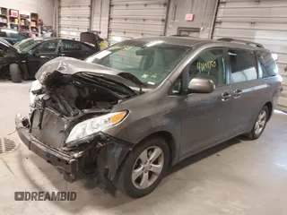 2015 Toyota Sienna LE AAS with VIN 5TDKK3DC6FS652281, listed as a IAAI auction lot 41891750 with 150,162 mi miles. Bid and sale history available at carsss.com. Image 17.