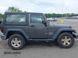 2016 Jeep Wrangler Willys Wheeler with VIN 1C4GJWAG2GL318981, listed as a IAAI auction lot 42390588 with 131,559 mi miles and . Bid and sale history available at DreamBid. Image 13.
