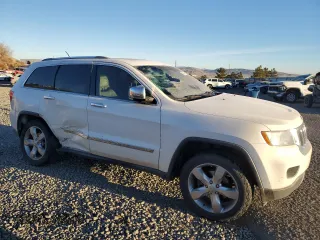 2011 Jeep Grand Cherokee Overland with VIN 1J4RS6GG9BC629680, listed as a Copart auction lot 83861474 with 175,547 mi miles and Salvage Title. Bid and sale history available at DreamBid. Image 4.