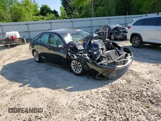2017 Toyota Camry XLE z VIN 4T1BF1FK0HU700820, wystawiony jako Copart lot #52010655 z przebiegiem Nie podano mil oraz Szkoda całkowita • Salvage title. Historia ofert i sprzedaży dostępna na DreamBid. Obrazek 11.