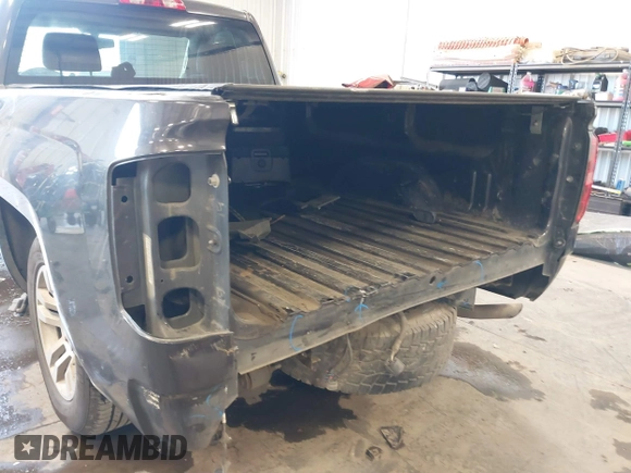 2014 Chevrolet Silverado 1500 with VIN 1GCNCREH0EZ393422, listed as a IAAI auction lot 41730168 with 113,861 mi miles and . Bid and sale history available at DreamBid. Image 6.