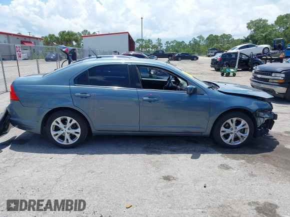 2012 Ford Fusion SE with VIN 3FAHP0HA7CR272566, listed as a IAAI auction lot 42539791 with 193,417 mi miles and . Bid and sale history available at DreamBid. Image 14.