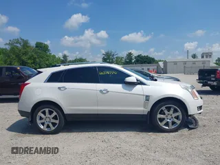 2010 Cadillac SRX Premium Collection with VIN 3GYFNFEY1AS575046, listed as a IAAI auction lot 42576770 with 135,129 mi miles and . Bid and sale history available at DreamBid. Image 13.