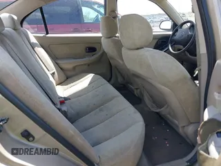 2003 Hyundai Elantra GLS z VIN KMHDN45D83U514659, wystawiony jako IAAI lot #42016920 z przebiegiem 125 673 mil mil oraz . Historia ofert i sprzedaży dostępna na DreamBid. Obrazek 8.