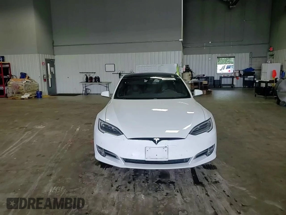 2016 Tesla Model S 90D with VIN 5YJSA1E22GF150015, listed as a Copart auction lot 61559375 with 75,609 mi miles and Salvage title. Bid and sale history available at DreamBid. Image 13.