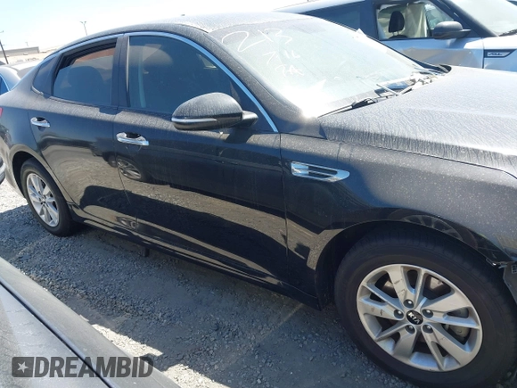 2017 Kia Optima LX z VIN KNAGT4L33H5156094, wystawiony jako IAAI lot #42405505 z przebiegiem 111 622 mil mil oraz . Historia ofert i sprzedaży dostępna na DreamBid. Obrazek 13.