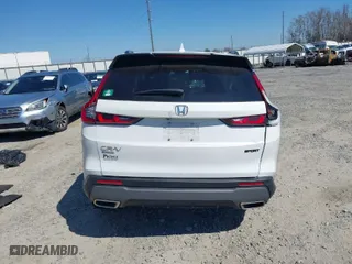 2023 Honda CR-V Hybrid Sport with VIN 2HKRS5H50PH704615, listed as a IAAI auction lot 41674571 with NaN miles. Bid and sale history available at carsss.com. Image 16.