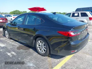 2025 Toyota Camry LE with VIN 4T1DAACK7SU518065, listed as a IAAI auction lot 41974635 with 17,279 mi miles and . Bid and sale history available at DreamBid. Image 3.