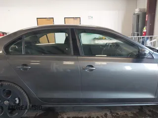 2014 Volkswagen Jetta Sedan S with VIN 3VW2K7AJ5EM410491, listed as a IAAI auction lot 42083614 with 65,960 mi miles. Bid and sale history available at carsss.com. Image 14.