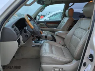 2004 Lexus LX 470 with VIN JTJHT00W243543558, listed as a Copart auction lot 74859974 with 189,556 mi miles and Salvage Title. Bid and sale history available at carsss.com. Image 7.