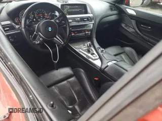 2014 BMW M6 z VIN WBSLX9C52ED160071, wystawiony jako Copart lot #77452554 z przebiegiem 64 814 mil mil oraz Szkoda całkowita • Salvage title. Historia ofert i sprzedaży dostępna na DreamBid. Obrazek 8.