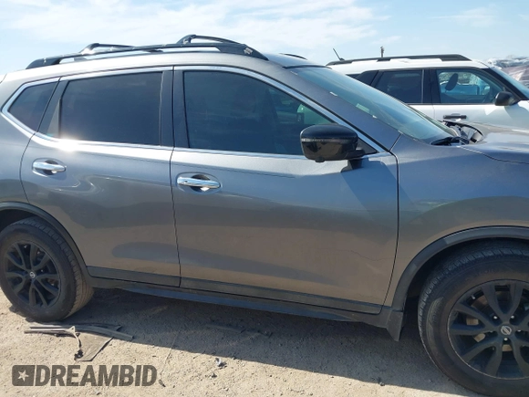 2018 Nissan Rogue SV with VIN 5N1AT2MT2JC749146, listed as a IAAI auction lot 41672824 with 121,377 mi miles and . Bid and sale history available at carsss.com. Image 13.