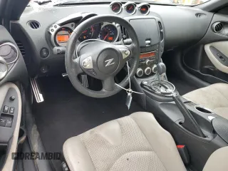 2009 Nissan 370Z Touring with VIN JN1AZ44E69M404789, listed as a Copart auction lot 62015094 with 56,447 mi miles and Salvage Title. Bid and sale history available at carsss.com. Image 8.