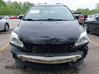 2010 Mazda 5 Sport with VIN JM1CR2W33A0360848, listed as a IAAI auction lot 42104824 with 151,084 mi miles and . Bid and sale history available at DreamBid. Image 6.