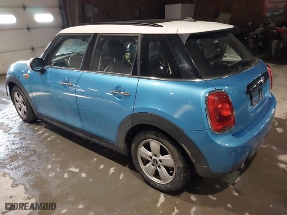 2018 MINI Hardtop 4 Door Cooper with VIN WMWXU1C51J2F80624, listed as a IAAI auction lot 41460317 with 81672 miles. Bid and sale history available at carsss.com. Image 3.