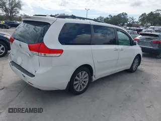 2011 Toyota Sienna XLE with VIN 5TDDK3DC6BS029472, listed as a IAAI auction lot 41554859 with 145,393 mi miles. Bid and sale history available at carsss.com. Image 4.
