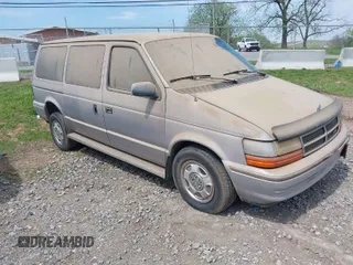 1991 Dodge Grand Caravan with VIN 1B4GK54R6MX632977, listed as a IAAI auction lot 42063934 with 130,812 mi miles and . Bid and sale history available at DreamBid. Image 1.