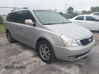 2014 Kia Sedona EX with VIN KNDMH4C74E6578326, listed as a IAAI auction lot 41990311 with 220,772 mi miles. Bid and sale history available at carsss.com. Image 1.