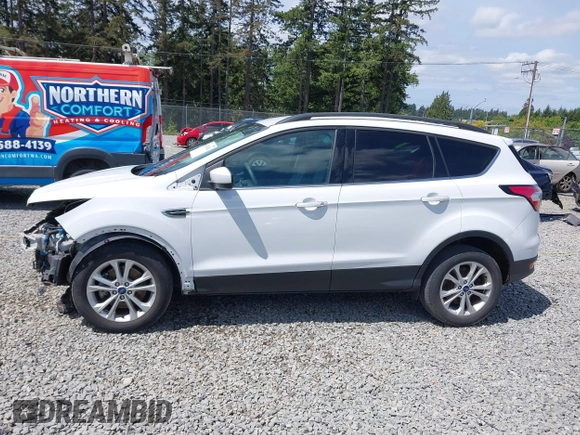 2018 Ford Escape SE z VIN 1FMCU9GD6JUB45046, wystawiony jako IAAI lot #42314262 z przebiegiem 107 962 mil mil oraz . Historia ofert i sprzedaży dostępna na DreamBid. Obrazek 15.