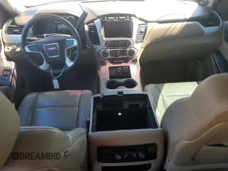 2016 GMC Yukon SLT with VIN 1GKS1BKCXGR439435, listed as a Copart auction lot 61202804 with 168,196 mi miles and Salvage Title. Bid and sale history available at carsss.com. Image 8.