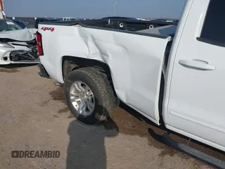 2015 Chevrolet Silverado 1500 LT with VIN 1GCVKREC3FZ446851, listed as a IAAI auction lot 41503353 with Not Provided miles and . Bid and sale history available at DreamBid. Image 6.