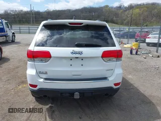 2014 Jeep Grand Cherokee Limited z VIN 1C4RJFBG9EC122590, wystawiony jako IAAI lot #42037881 z przebiegiem 137 270 mil mil oraz . Historia ofert i sprzedaży dostępna na DreamBid. Obrazek 16.