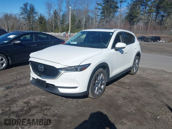 2019 Mazda CX-5 Grand Touring with VIN JM3KFBDM2K0672720, listed as a IAAI auction lot 41751196 with 51,632 mi miles and . Bid and sale history available at carsss.com. Image 17.