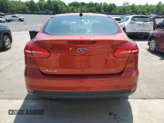 2018 Ford Focus SE z VIN 1FADP3F2XJL254750, wystawiony jako Copart lot #61907545 z przebiegiem 71 328 mil mil oraz Szkoda całkowita • Salvage title. Historia ofert i sprzedaży dostępna na DreamBid. Obrazek 6.