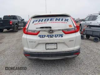 2017 Honda CR-V EX with VIN 2HKRW2H56HH682396, listed as a IAAI auction lot 41569854 with 74,392 mi miles. Bid and sale history available at carsss.com. Image 17.