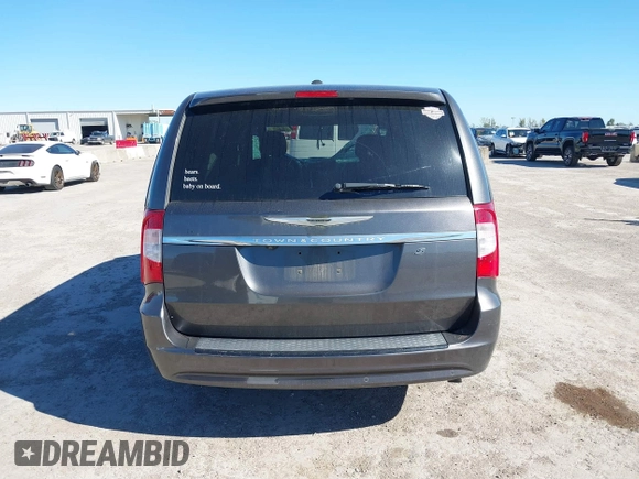 2016 Chrysler Town & Country S with VIN 2C4RC1HG9GR128212, listed as a IAAI auction lot 40858279 with 169,433 mi miles. Bid and sale history available at carsss.com. Image 16.