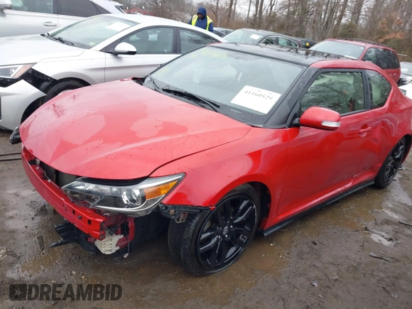 2016 Scion tC with VIN JTKJF5C76GJ025944, listed as a IAAI auction lot 41160529 with 121,495 mi miles. Bid and sale history available at carsss.com. Image 2.