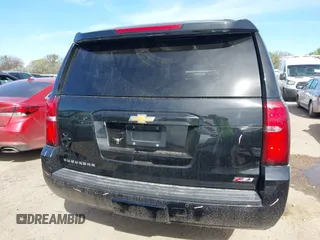 2016 Chevrolet Suburban LT with VIN 1GNSKHKC4GR275389, listed as a IAAI auction lot 41796216 with 144,776 mi miles and . Bid and sale history available at DreamBid. Image 17.