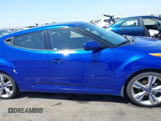 2013 Hyundai Veloster w/Black Int with VIN KMHTC6AD6DU143974, listed as a IAAI auction lot 42164745 with 136,195 mi miles and . Bid and sale history available at DreamBid. Image 13.