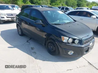 2013 Chevrolet Sonic LT with VIN 1G1JC5SH1D4131070, listed as a IAAI auction lot 42049296 with 97,669 mi miles and . Bid and sale history available at DreamBid. Image 1.