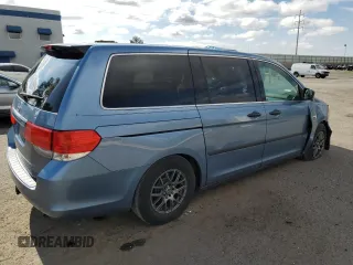2010 Honda Odyssey LX with VIN 5FNRL3H23AB054658, listed as a Copart auction lot 62322195 with 160,550 mi miles and Salvage title. Bid and sale history available at DreamBid. Image 3.