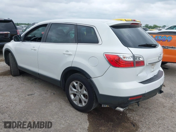 2011 Mazda CX-9 Touring with VIN JM3TB2CA4B0317250, listed as a IAAI auction lot 42103000 with 90,024 mi miles and . Bid and sale history available at DreamBid. Image 3.