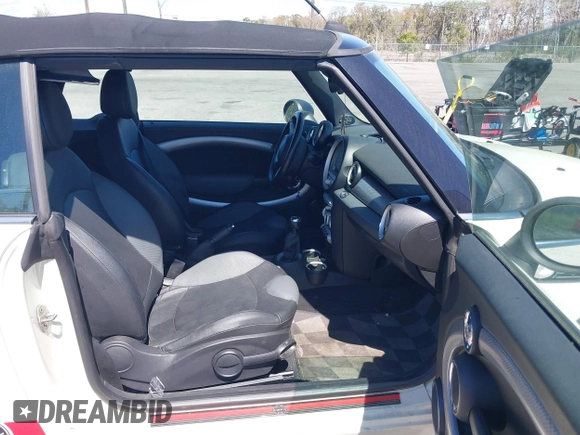 2010 MINI Convertible S with VIN WMWMS3C57ATY51245, listed as a IAAI auction lot 41802174 with 110,154 mi miles and . Bid and sale history available at DreamBid. Image 5.