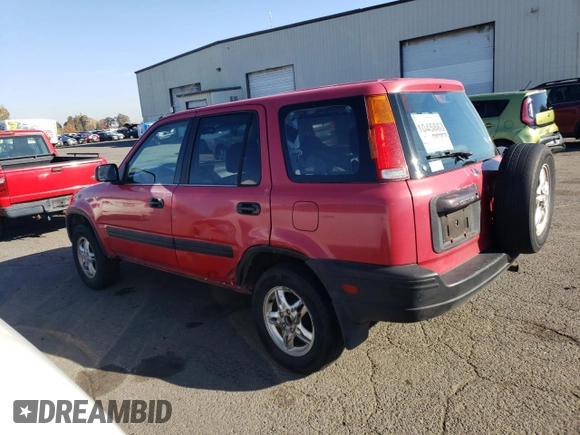 1999 Honda CR-V LX with VIN JHLRD2843XC014579, listed as a Copart auction lot 79394924 with 249,544 mi miles and Salvage Title. Bid and sale history available at carsss.com. Image 2.