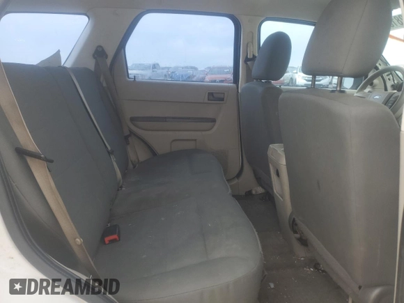2011 Ford Escape XLS z VIN 1FMCU9C71BKC61705, wystawiony jako Copart lot #53281065 z przebiegiem 206 804 mil mil oraz Szkoda całkowita • Salvage title. Historia ofert i sprzedaży dostępna na DreamBid. Obrazek 11.