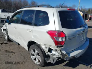 2015 Subaru Forester 2.5i Premium with VIN JF2SJADC8FG518276, listed as a IAAI auction lot 41330776 with 137,209 mi miles. Bid and sale history available at carsss.com. Image 3.