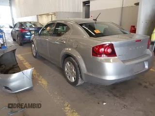 2014 Dodge Avenger SE with VIN 1C3CDZAB4EN161536, listed as a IAAI auction lot 41604009 with 107,957 mi miles. Bid and sale history available at carsss.com. Image 3.
